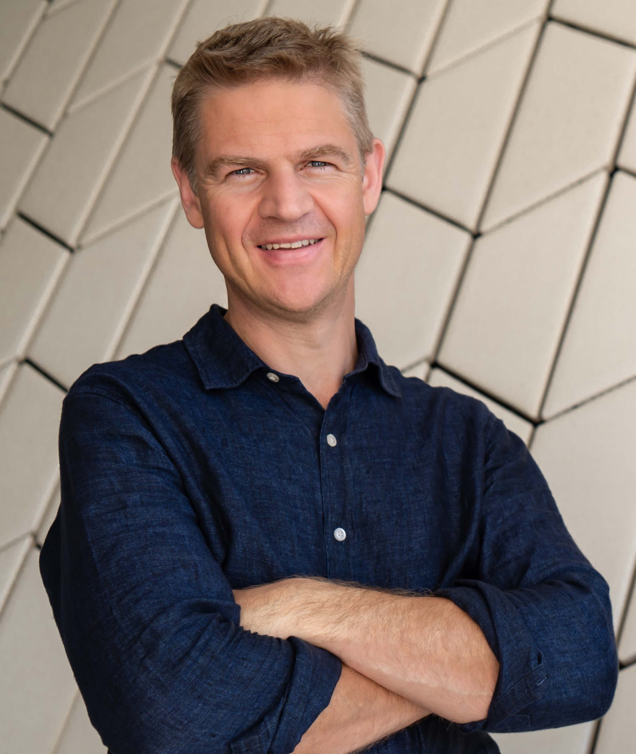 A profile picture of Nigel Eccles, CEO and co-founder of BetHog